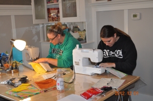 Laura & Amanda Peek sewing Boxie pouches